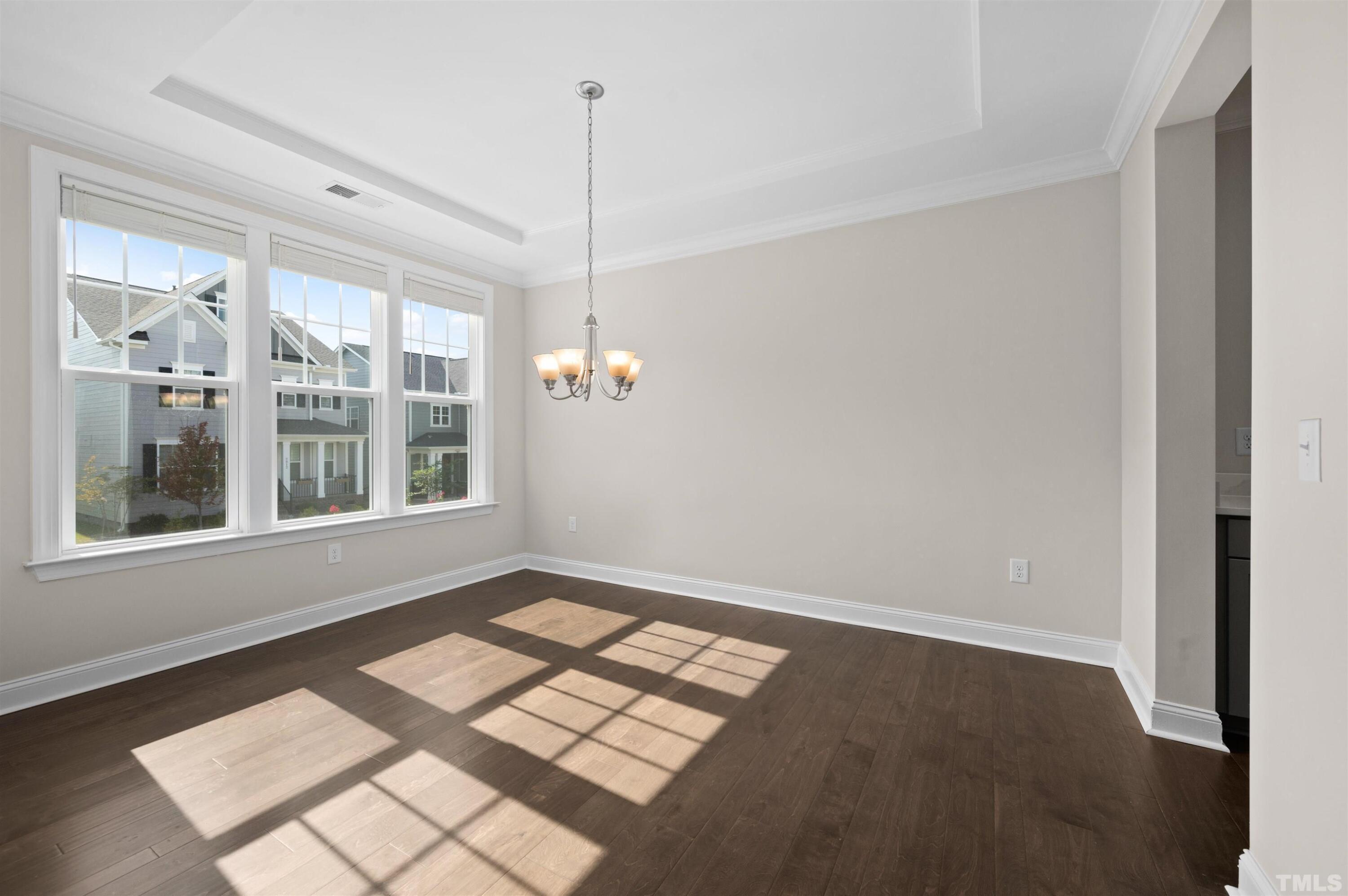 2917 Early Planting Avenue Apex, NC 27502 - Photo 3 of 41 a view of an empty room with a window