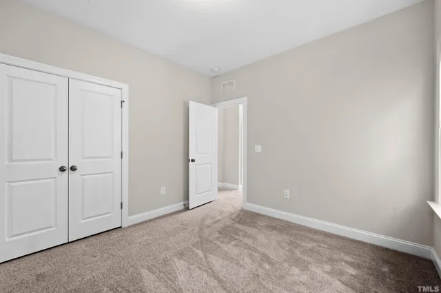 a view of a balcony with wooden floor