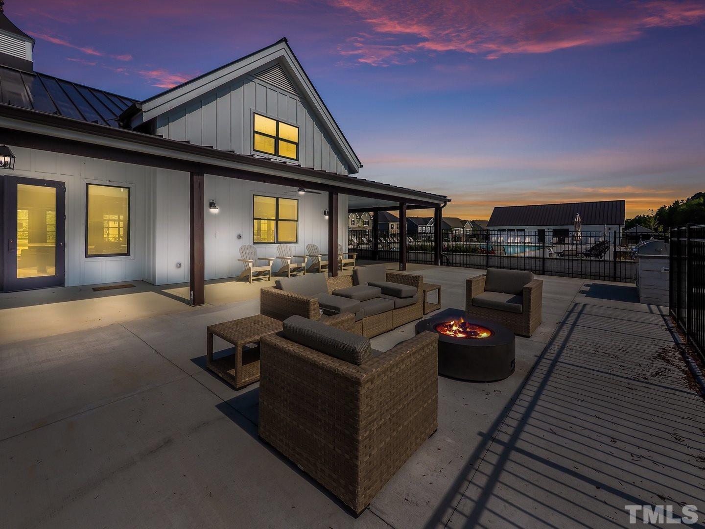 2917 Early Planting Avenue Apex, NC 27502 - Photo 39 of 41 a living room with furniture and a fireplace