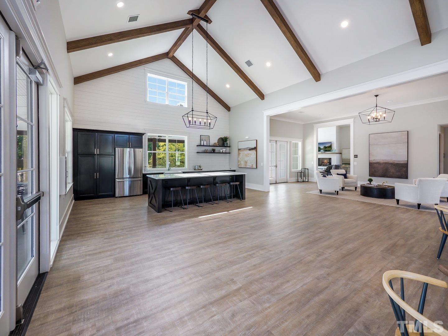 2917 Early Planting Avenue Apex, NC 27502 - Photo 40 of 41 a living room with furniture and a wooden floor