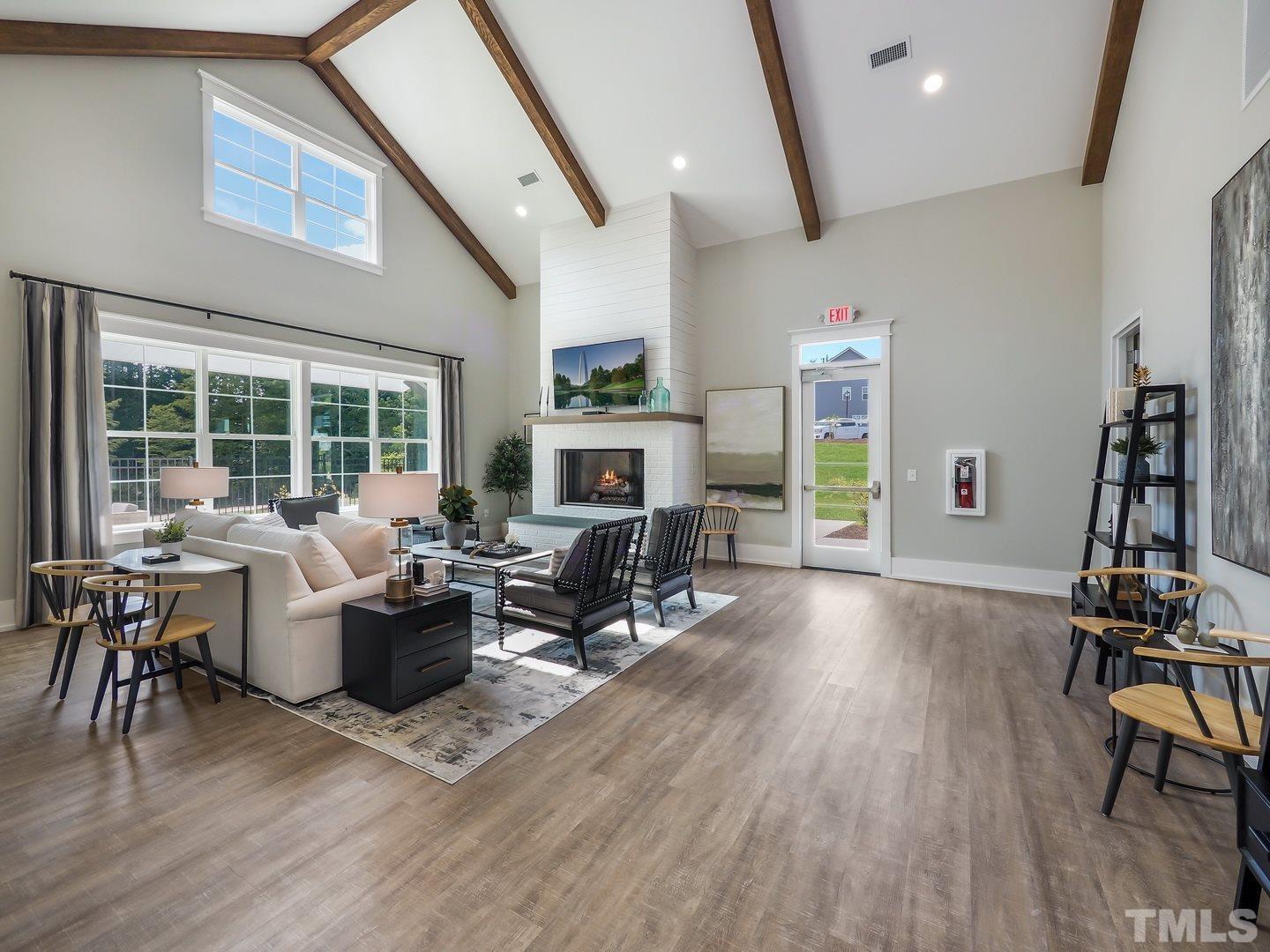 2917 Early Planting Avenue Apex, NC 27502 - Photo 41 of 41 a living room with furniture and a wooden floor