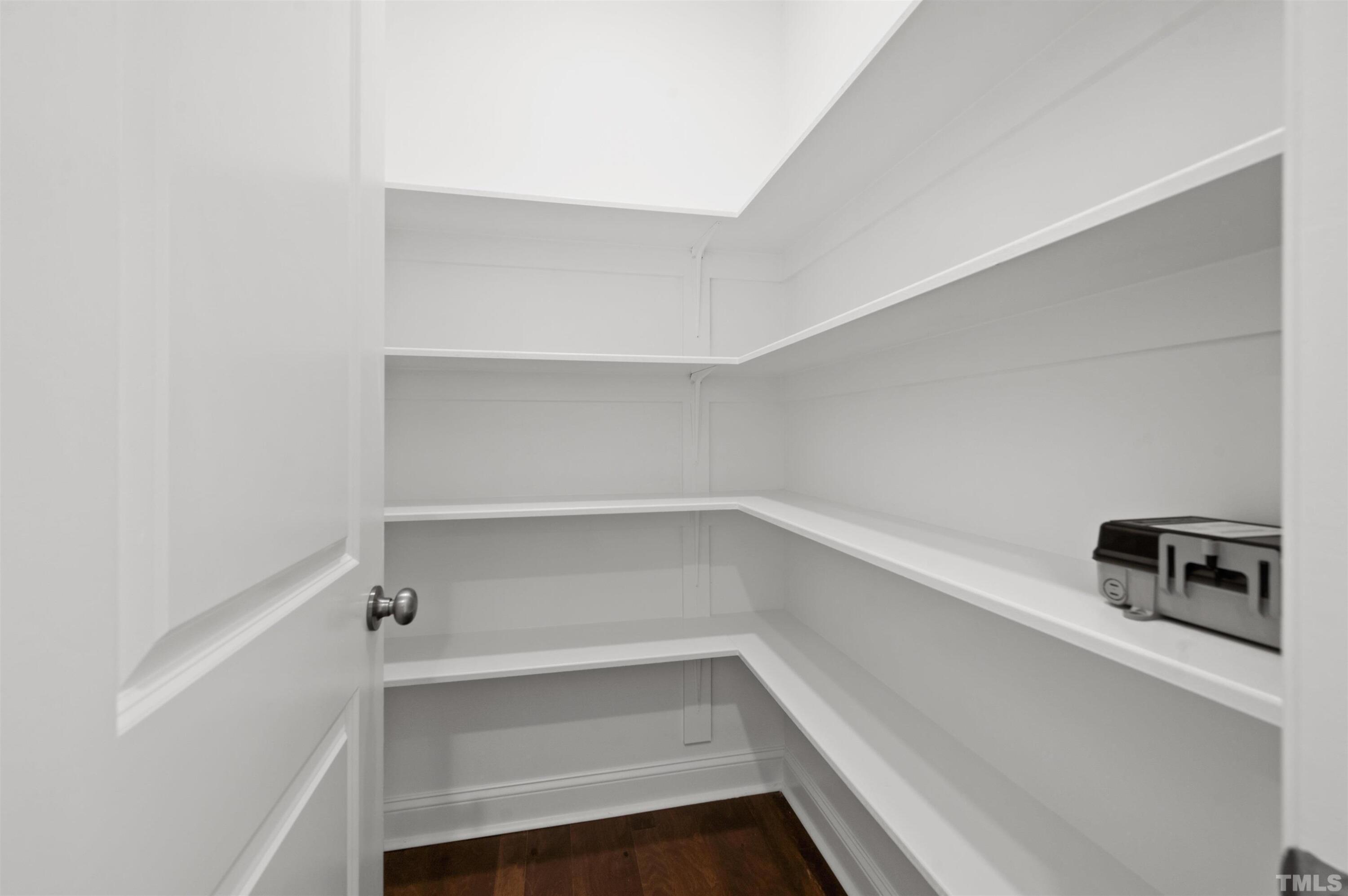 2917 Early Planting Avenue Apex, NC 27502 - Photo 5 of 41 a storage room with washer and dryer