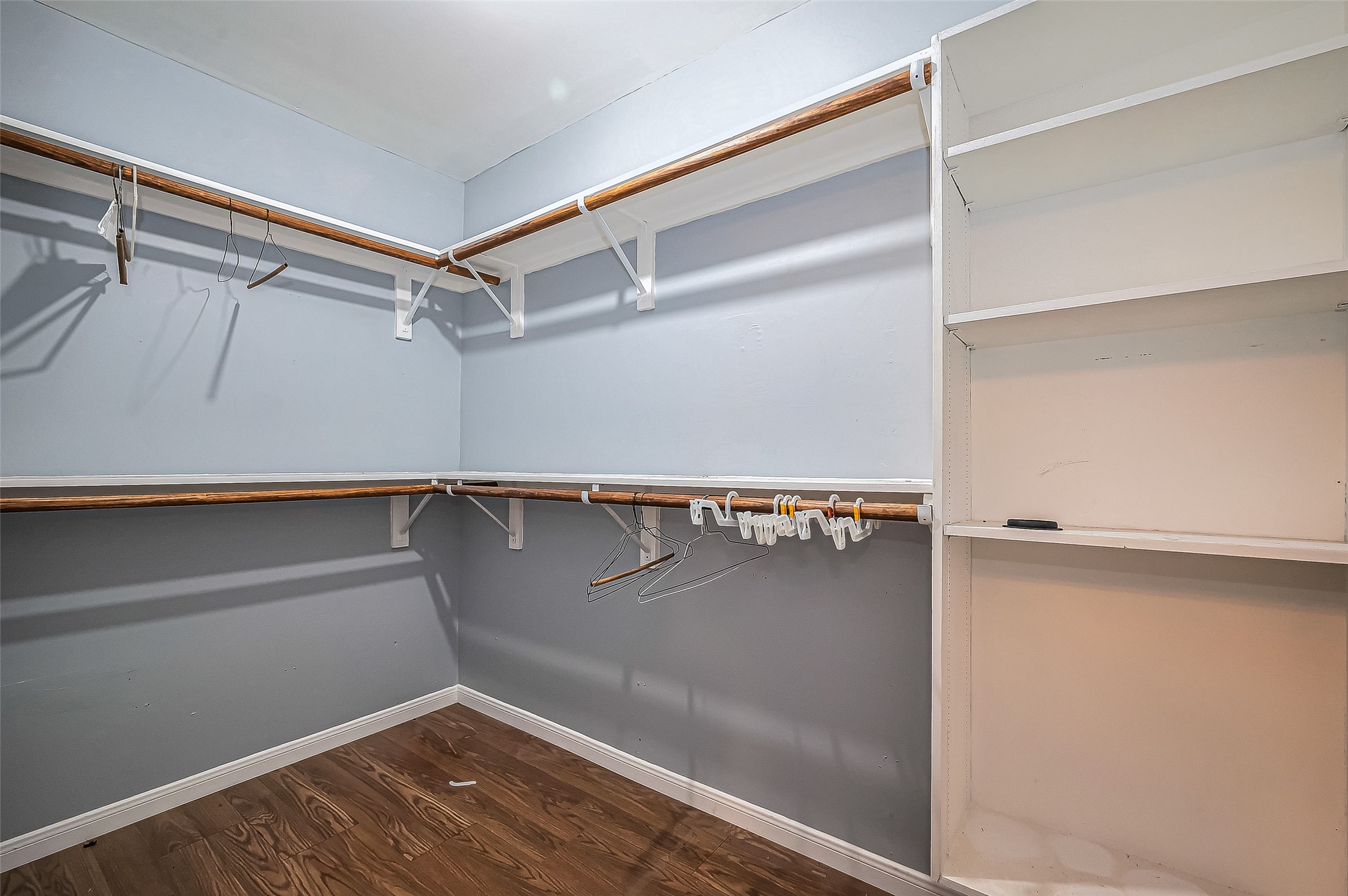710 East Sycamore Street Fresno, TX 77545 - Photo 26 of 32 a view of walk in closet with empty racks