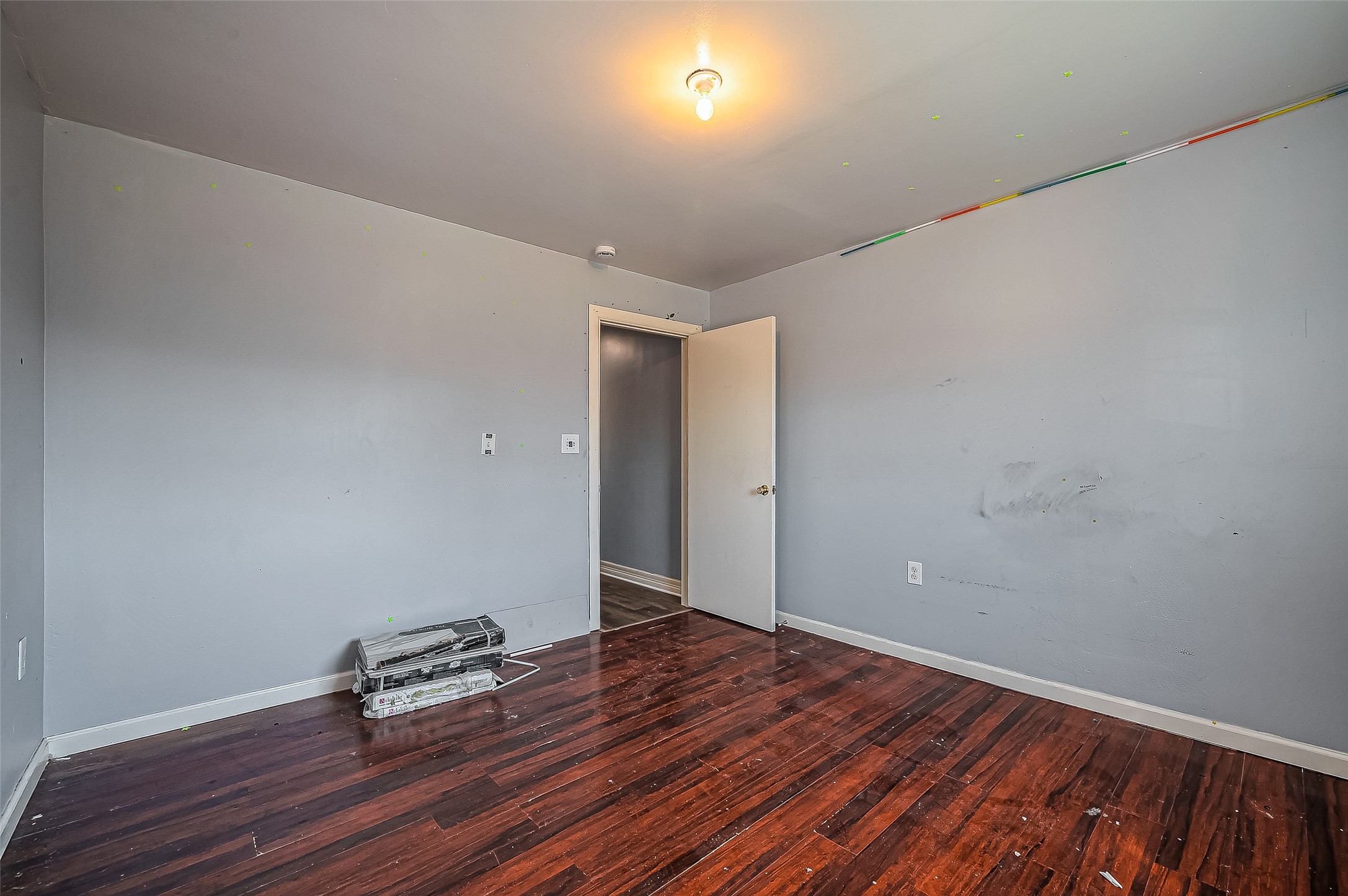 710 East Sycamore Street Fresno, TX 77545 - Photo 27 of 32 a view of room with wooden floor