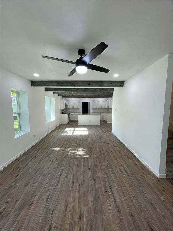 607 East Monterey Street Denison, TX 75021 - Photo 2 of 34 a view of empty room with wooden floor and fan