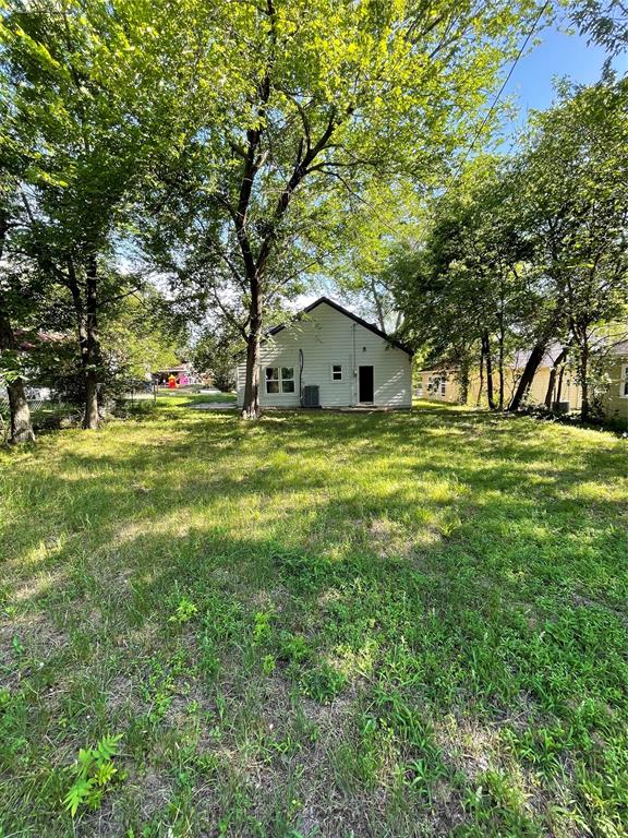 607 East Monterey Street Denison, TX 75021 - Photo 31 of 34 a house view with a outdoor space