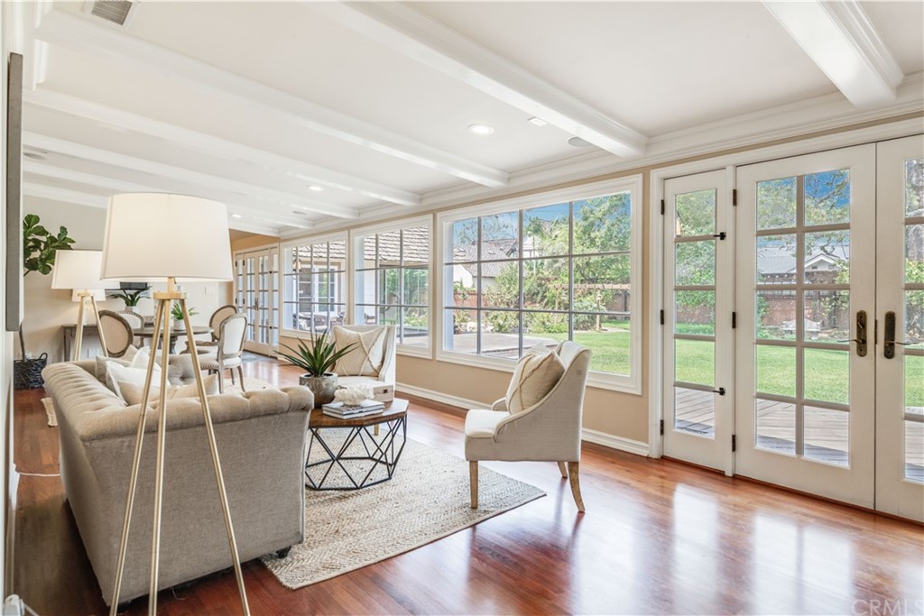 4255 Chestnut Avenue Long Beach, CA 90807 - Photo 14 of 48 a living room with furniture and wooden floor