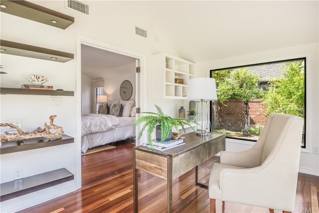 4255 Chestnut Avenue Long Beach, CA 90807 - Photo 25 of 48 a living room with furniture and a large window