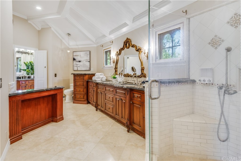 4255 Chestnut Avenue Long Beach, CA 90807 - Photo 28 of 48 a kitchen with stainless steel appliances granite countertop a stove a sink and a refrigerator