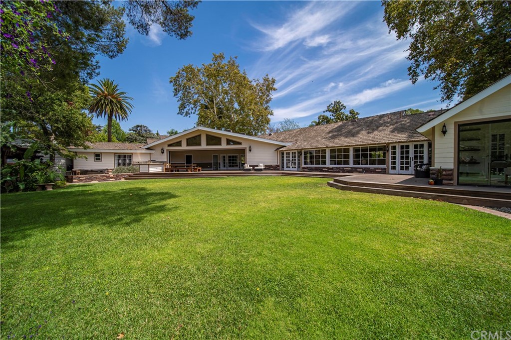 4255 Chestnut Avenue Long Beach, CA 90807 - Photo 35 of 48 a view of a house with a big yard