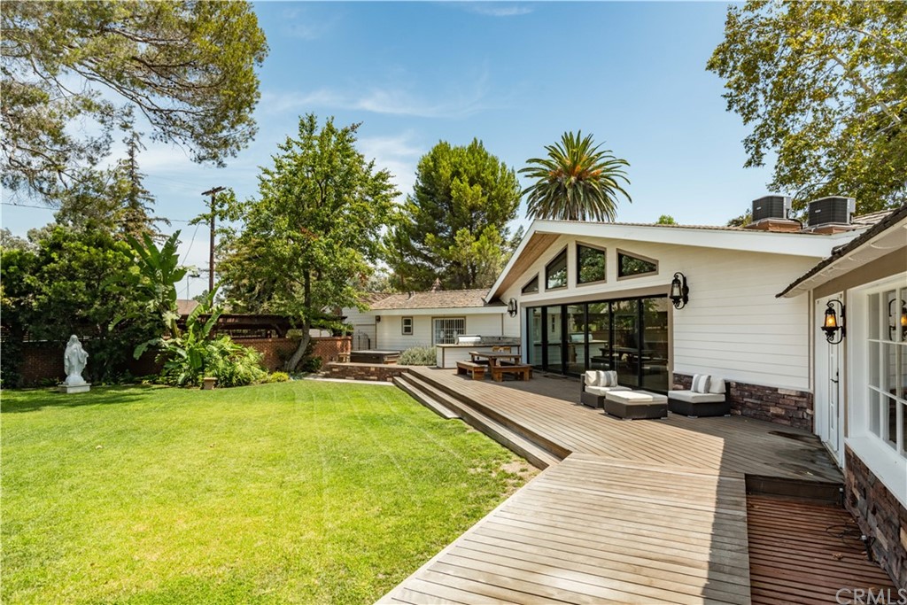 4255 Chestnut Avenue Long Beach, CA 90807 - Photo 42 of 48 a front view of a house with swimming pool