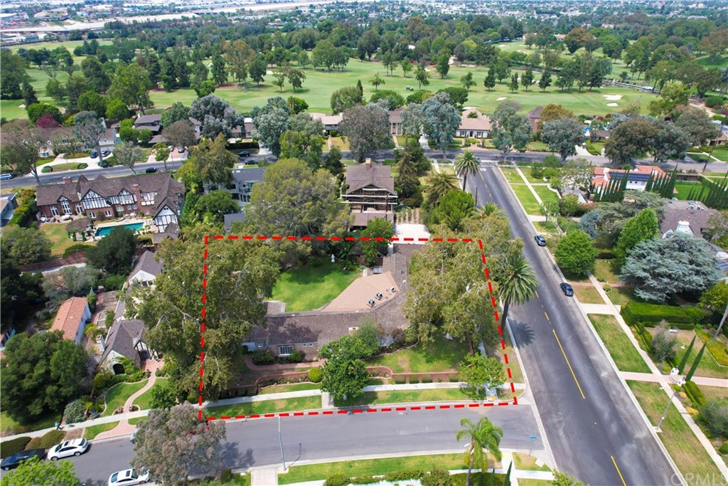 4255 Chestnut Avenue Long Beach, CA 90807 - Photo 44 of 48 an aerial view of residential houses with outdoor space and swimming pool