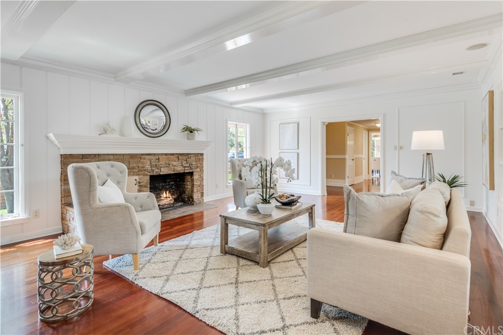4255 Chestnut Avenue Long Beach, CA 90807 - Photo 5 of 48 a living room with furniture and a fireplace