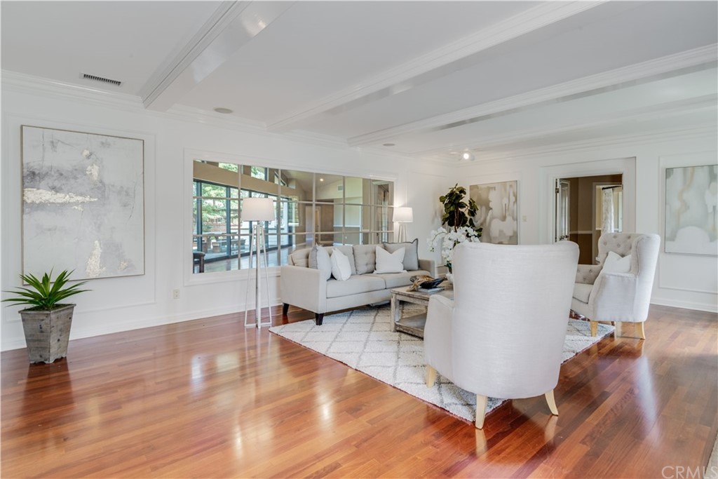 4255 Chestnut Avenue Long Beach, CA 90807 - Photo 7 of 48 a living room with furniture wooden floor and a table