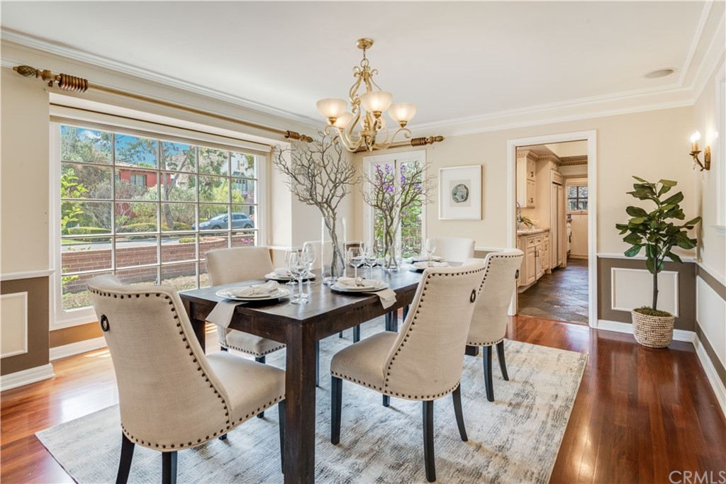 4255 Chestnut Avenue Long Beach, CA 90807 - Photo 9 of 48 a view of a dining room with furniture window and wooden floor