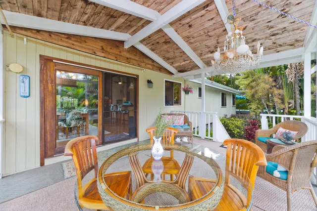 a view of a patio with chairs and tables
