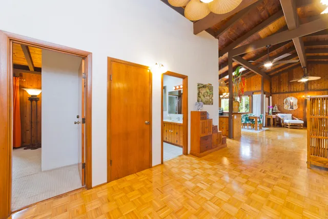 a view of a living room and bathroom