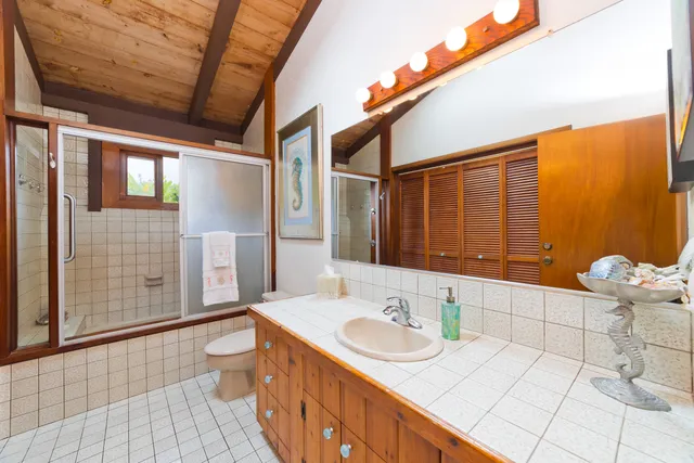 a bathroom with a sink and mirror