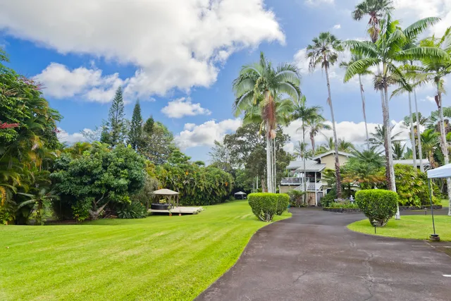 a house with garden in front of it