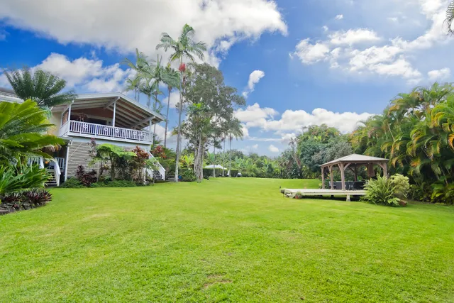 a house with garden in front of it