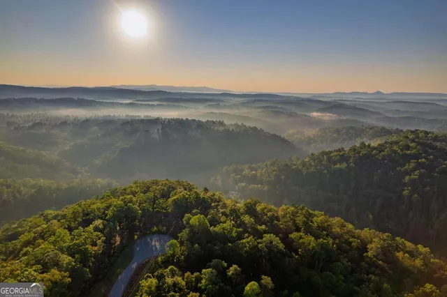 a view of lake with mountain