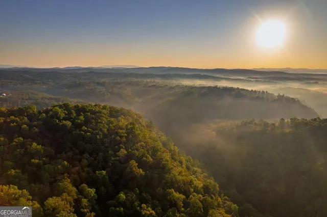 a view of lake and mountain