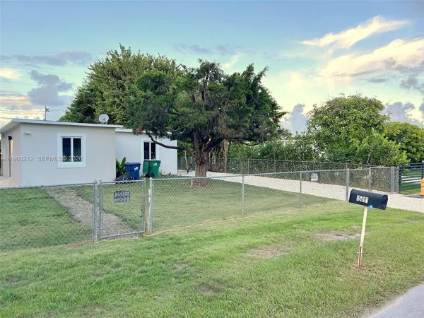a view of a backyard with a slide
