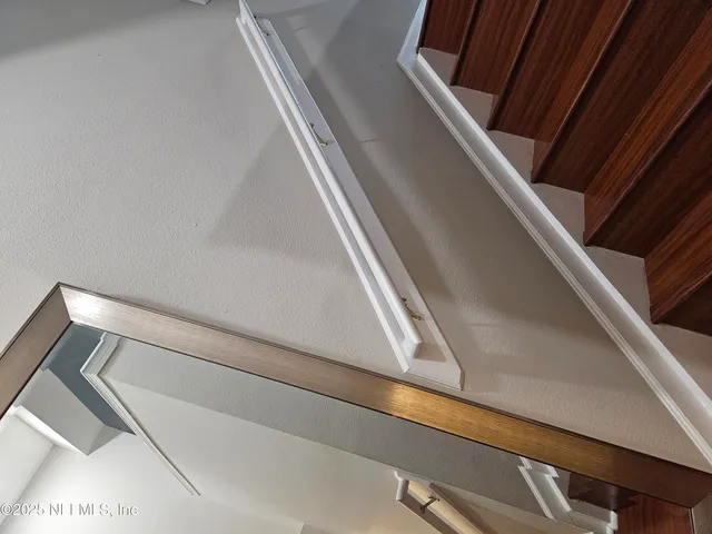 a view of balcony with wooden floor