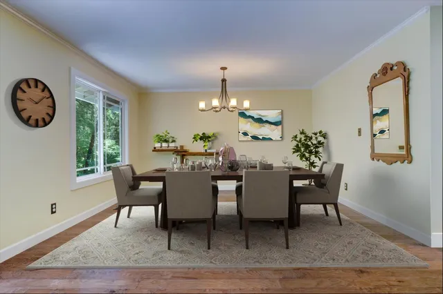 a kitchen with stainless steel appliances a refrigerator and a stove top oven