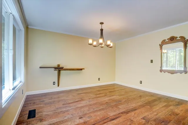 a stove top oven sitting inside of a kitchen