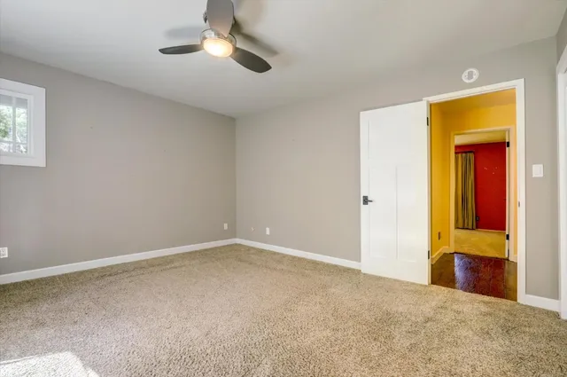 a view of a house with a large window