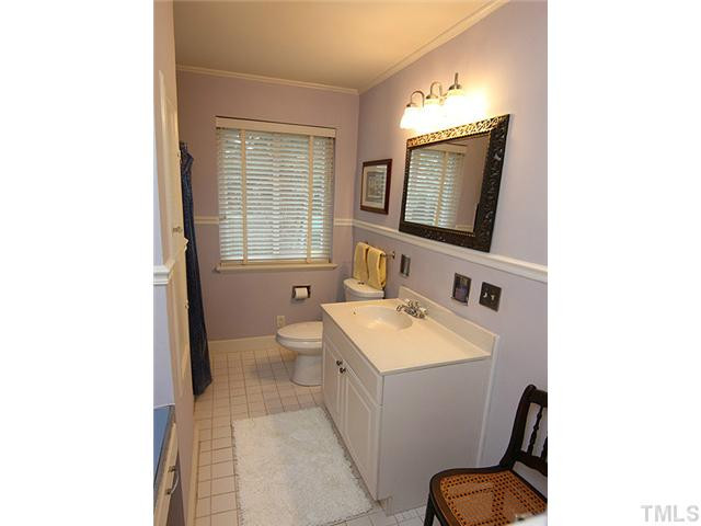 3015 Ruffin Street Raleigh, NC 27607 - Photo 25 of 25 Tile floor, updated fixtures, light, bright, and open floor plan for you to enjoy. Bathroom