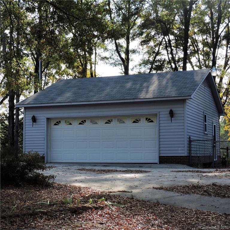 848 South Potter Road Lancaster, SC 29720 - Photo 21 of 24 a front view of a house with a garden