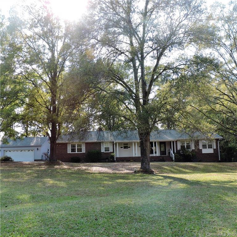 848 South Potter Road Lancaster, SC 29720 - Photo 22 of 24 a front view of a house with a garden