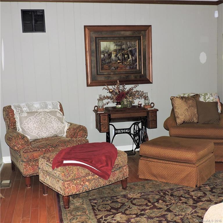 848 South Potter Road Lancaster, SC 29720 - Photo 6 of 24 a living room with furniture and wooden floor