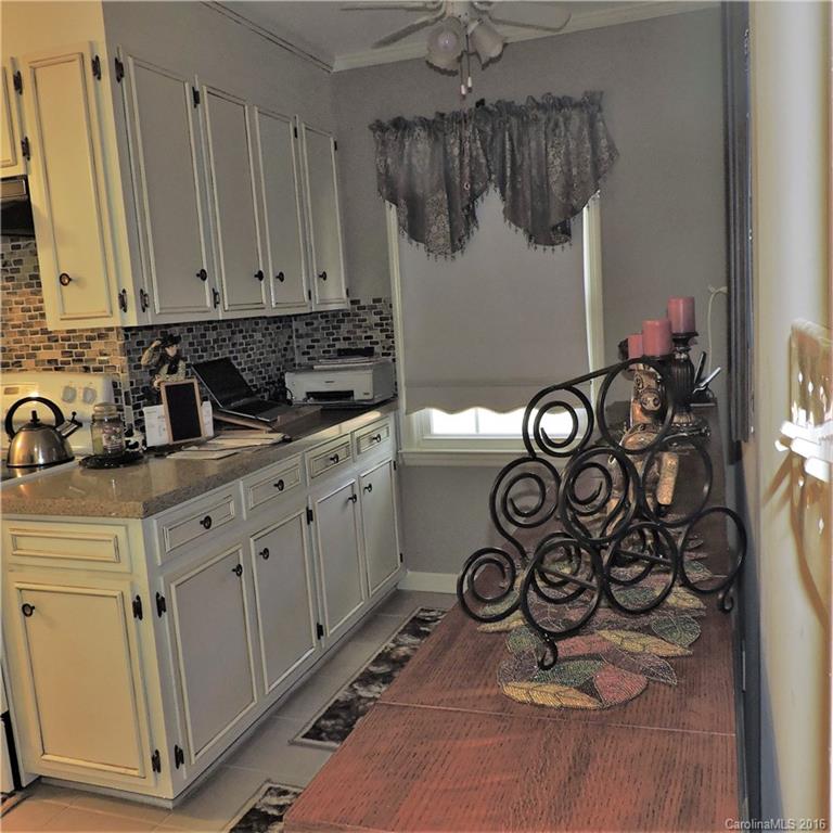 848 South Potter Road Lancaster, SC 29720 - Photo 8 of 24 a bathroom with a sink and a mirror