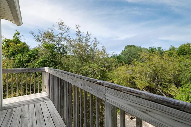 a kitchen with a refrigerator a stove a microwave and cabinets