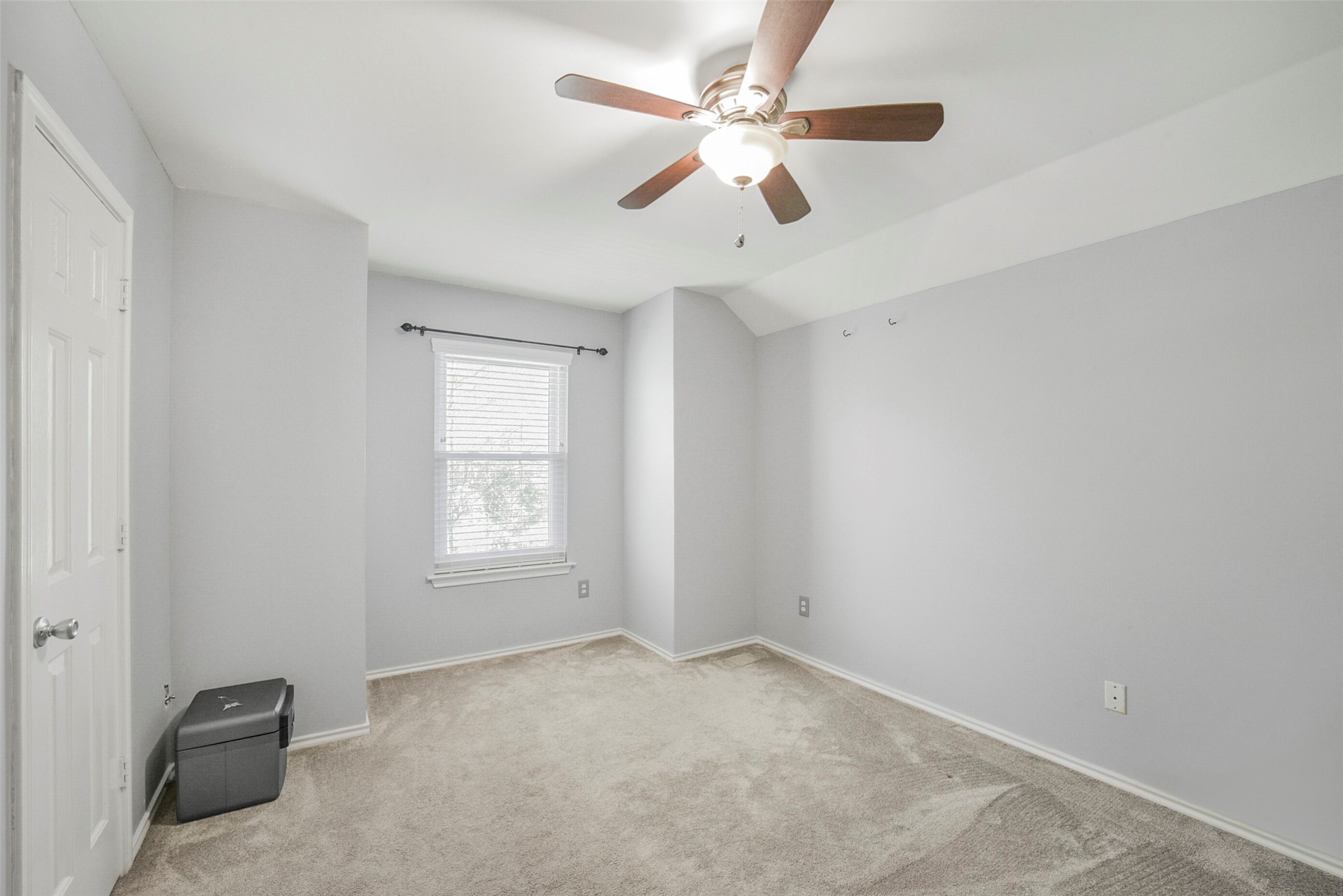 38 Tallow Hill Place Spring, TX 77382 - Photo 34 of 50 an empty room with a window and a fan