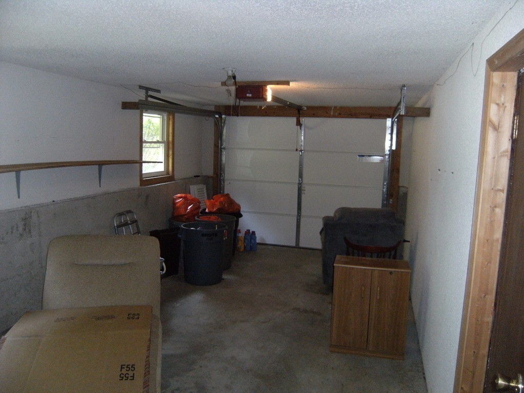 225 Huntington Road Russell, MA 01071 - Photo 15 of 20 a room with furniture and a window
