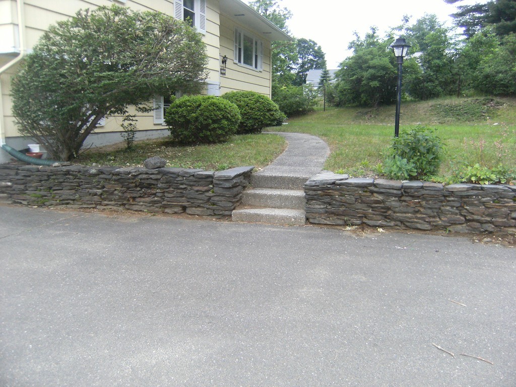 225 Huntington Road Russell, MA 01071 - Photo 2 of 20 a front view of a house with a yard