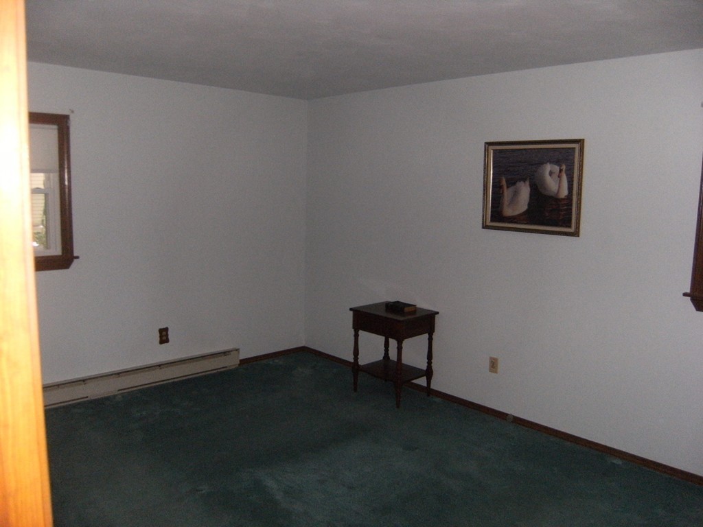 225 Huntington Road Russell, MA 01071 - Photo 8 of 20 an empty room with a workbench