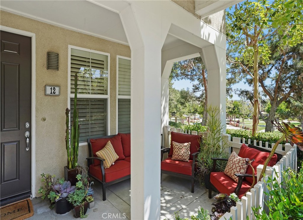 12 Platinum Circle Ladera Ranch, CA 92694 - Photo 1 of 1 a outdoor living space with furniture and a potted plant