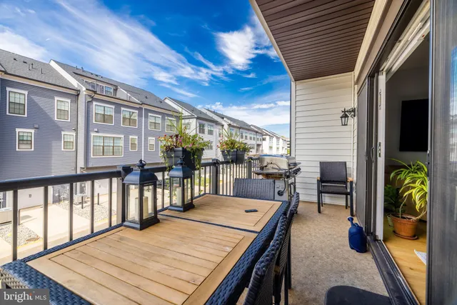 a dining room with table and chairs