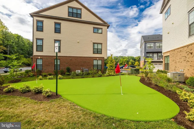 a view of a back yard of the house