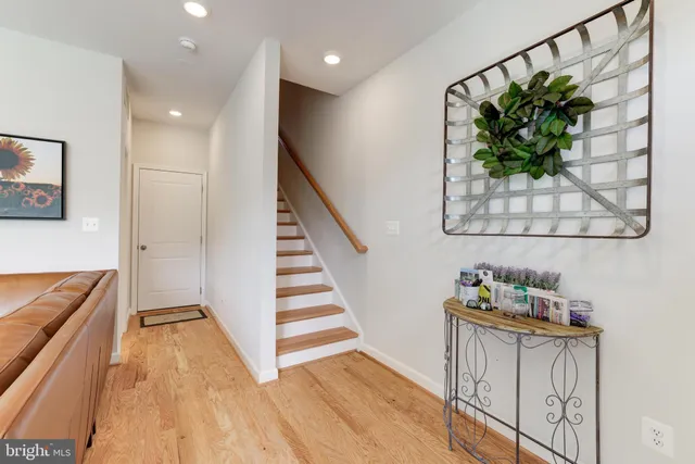 a view of entryway with wooden floor