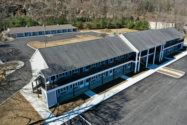 an aerial view of a house with balcony