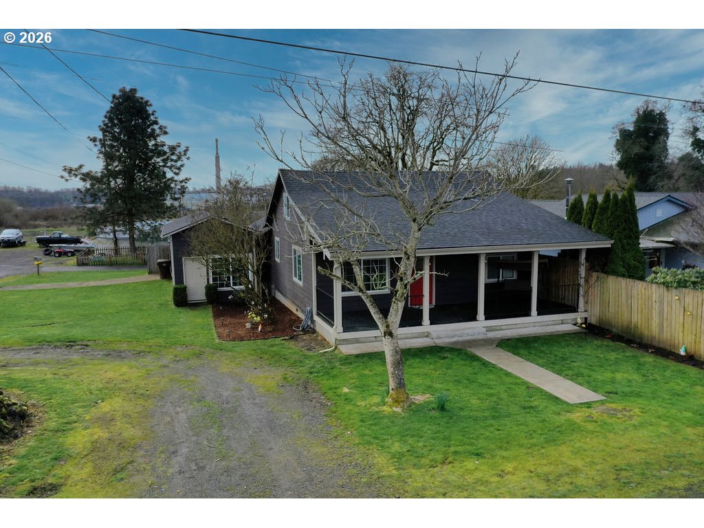 1045 Umatilla Street St. Helens, OR 97051 - Photo 1 of 43 a view of a house with a yard and sitting area