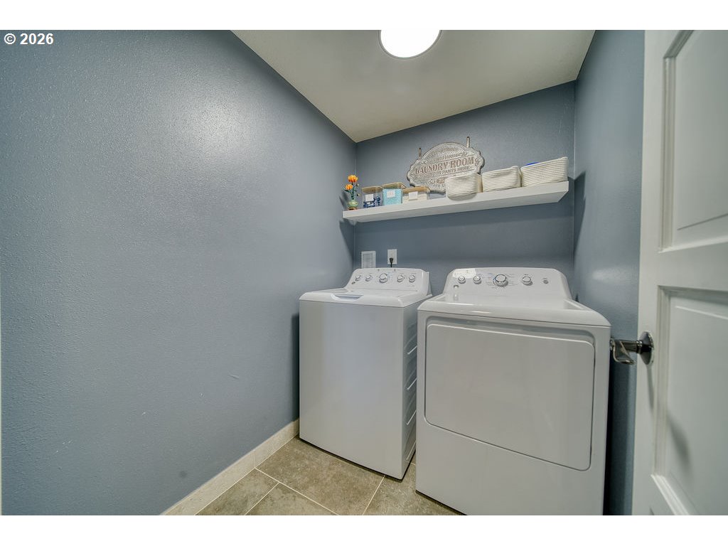 1045 Umatilla Street St. Helens, OR 97051 - Photo 23 of 43 a utility room with dryer and washer
