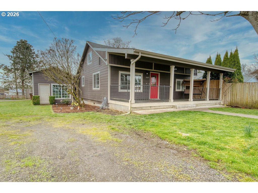 1045 Umatilla Street St. Helens, OR 97051 - Photo 4 of 43 a house with huge green field in front of it