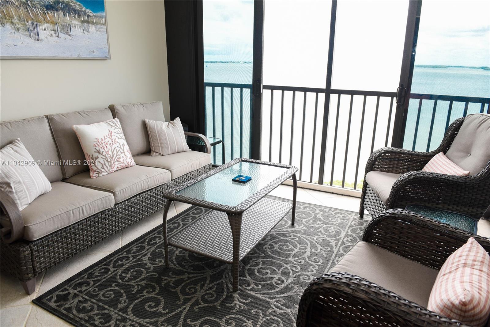 20 Northeast Plantation Road, Unit 306 Stuart, FL 34996 - Photo 13 of 20 a living room with furniture and a window